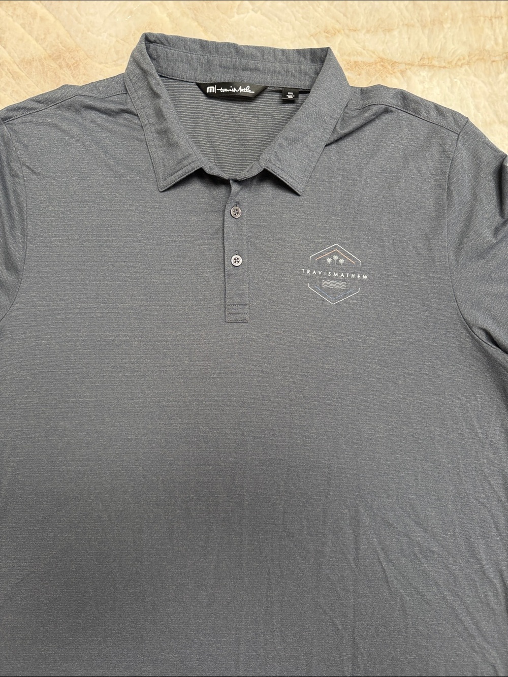 Travis Mathew Men's Dark Gray Polo with Subtle Logo